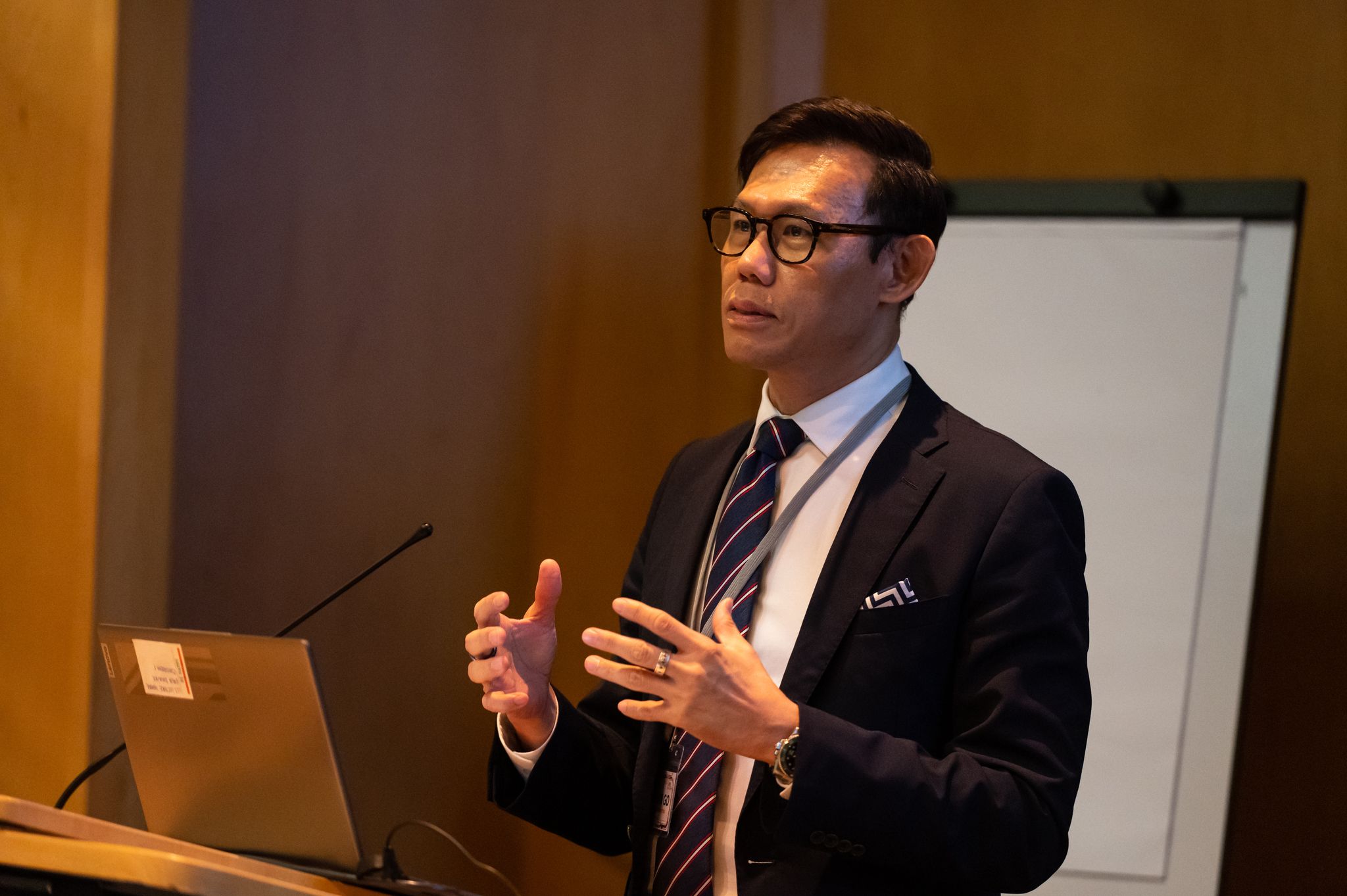 Dr. Alan Go — speaking at conference